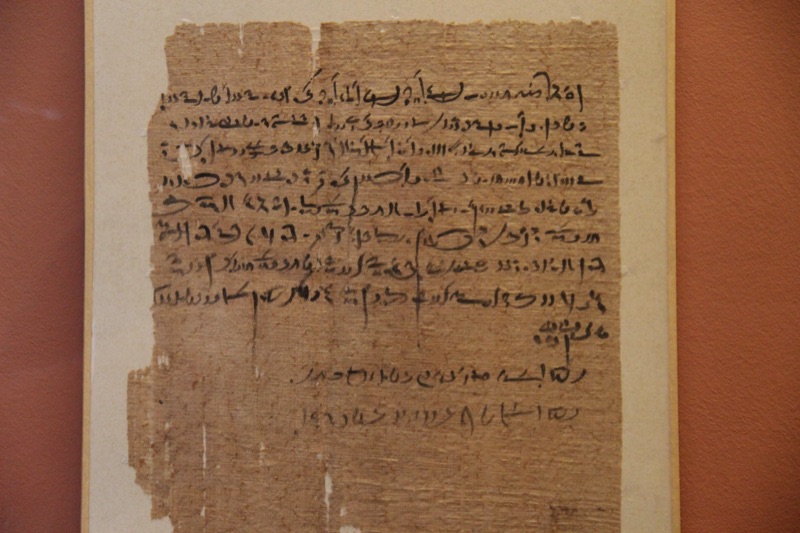 Ancient Egyptian papyrus writing displayed in the Louvre